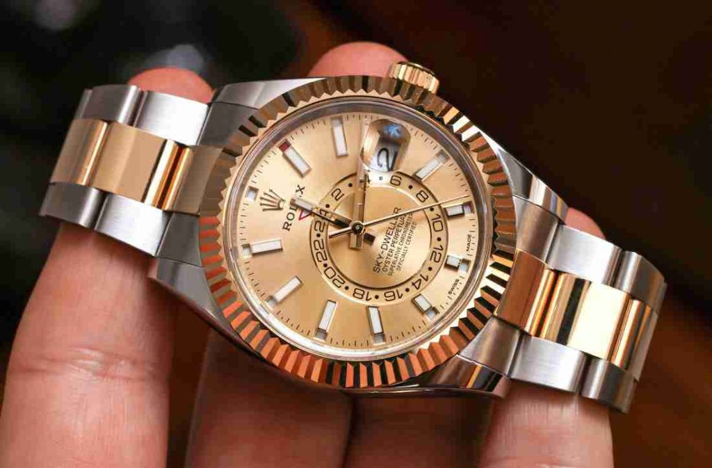 Replica Uhren Rolex Sky-Dweller Oyster Perpetual Champagner Zifferblatt Gelbgold 42mm